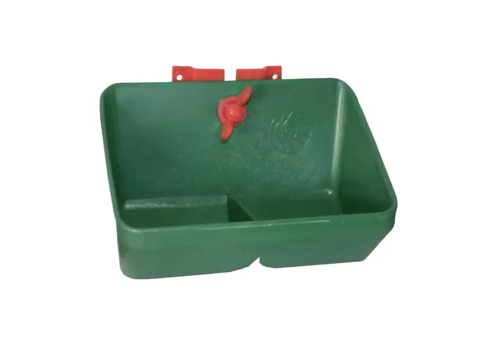 Wall mounted piglet feeding trough